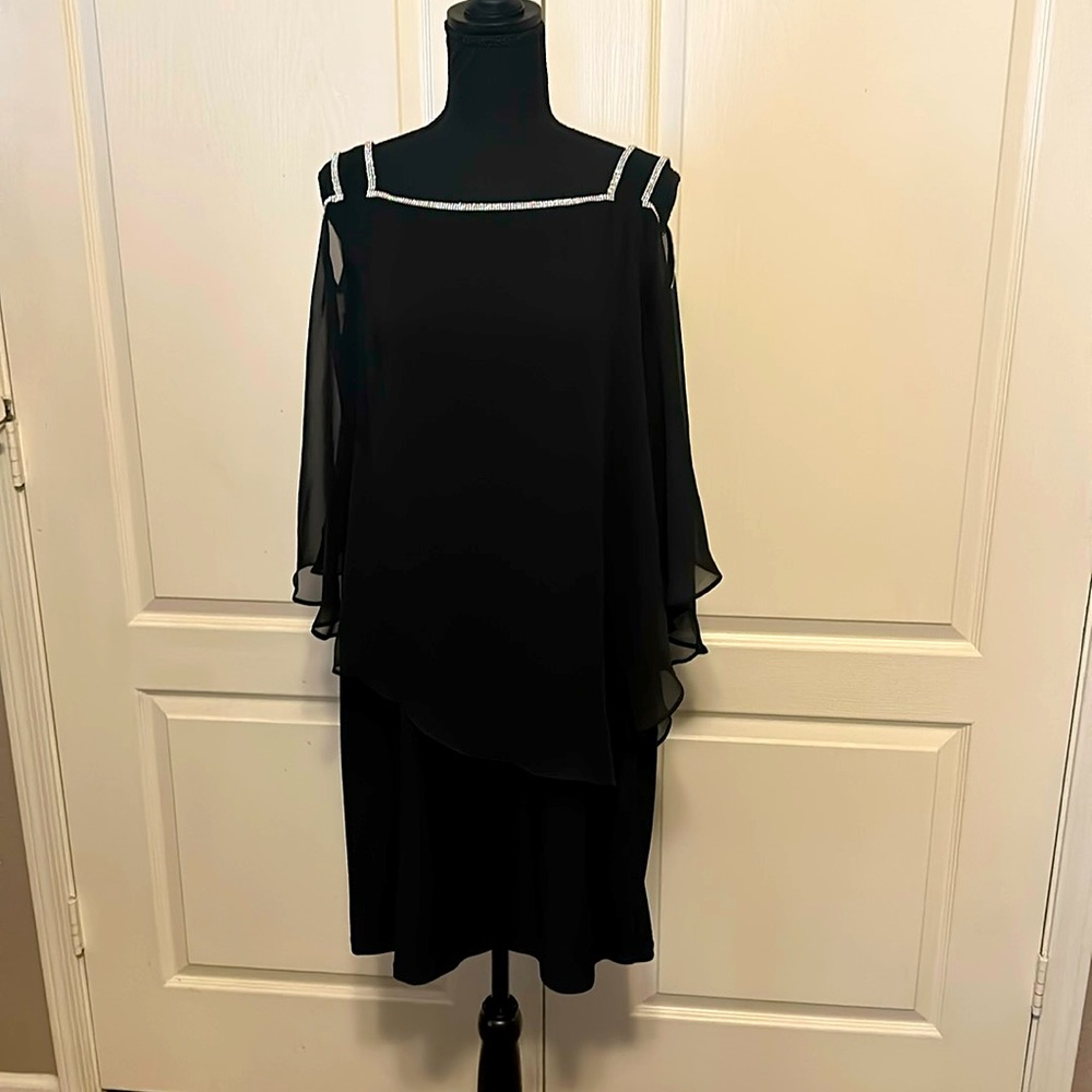 Roz&Ali Black Rhinestone around the Shoulders of the dress.